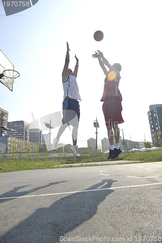 Image of streetball  game at early morning