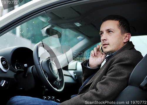 Image of man using car navigation