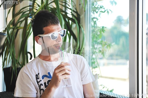 Image of man drink fresh morning coffee