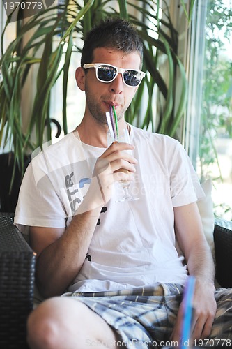 Image of man drink fresh morning coffee