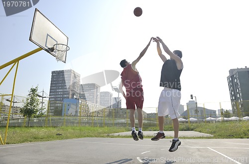 Image of streetball  game at early morning