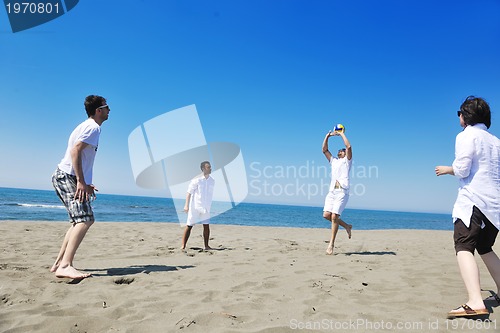 Image of happy young  people group have fun on beach