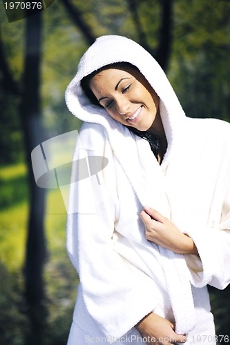 Image of Young woman take a steam bath