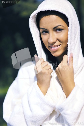 Image of Young woman take a steam bath