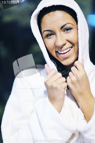 Image of Young woman take a steam bath