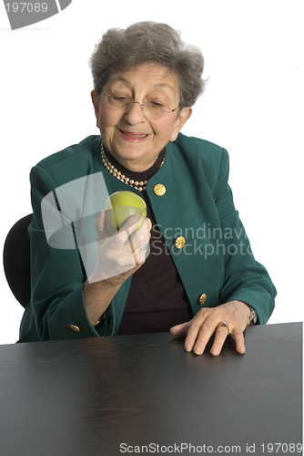 Image of woman eating an apple