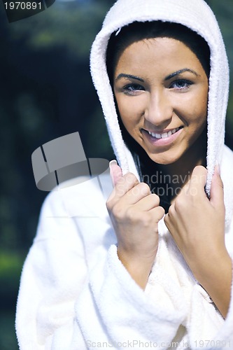 Image of Young woman take a steam bath