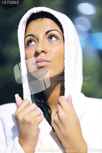 Image of Young woman take a steam bath