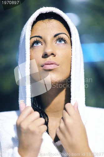 Image of Young woman take a steam bath