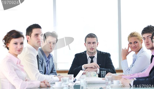 Image of group of business people at meeting