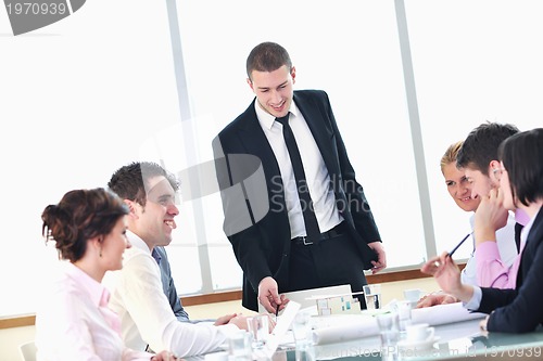 Image of group of business people at meeting