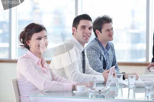 Image of group of business people at meeting