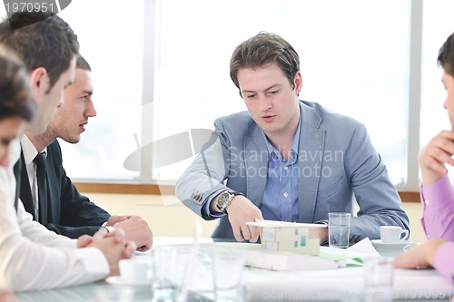 Image of group of business people at meeting