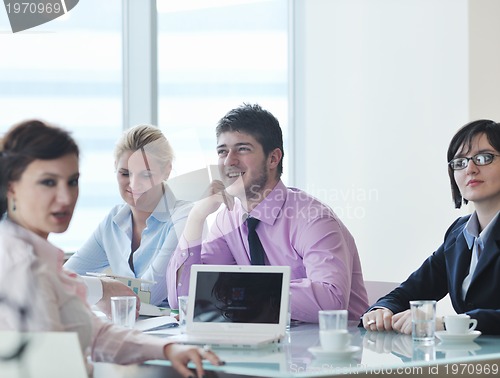 Image of group of business people at meeting