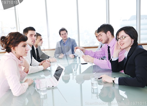 Image of group of business people at meeting