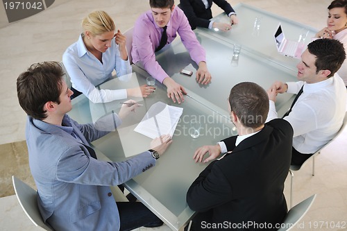 Image of group of business people at meeting