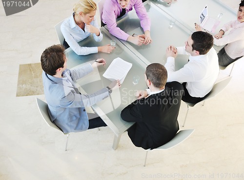 Image of group of business people at meeting