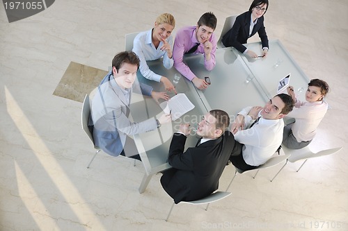 Image of group of business people at meeting