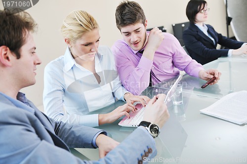 Image of group of business people at meeting