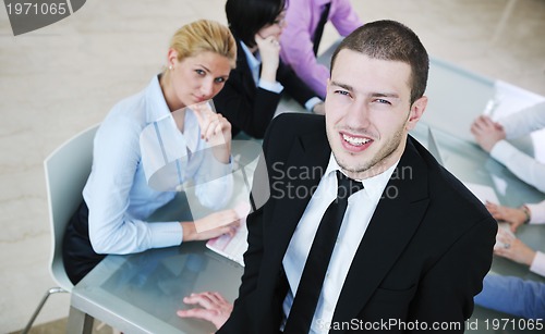 Image of group of business people at meeting