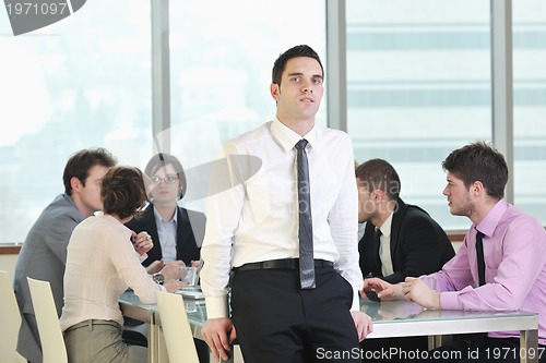 Image of group of business people at meeting