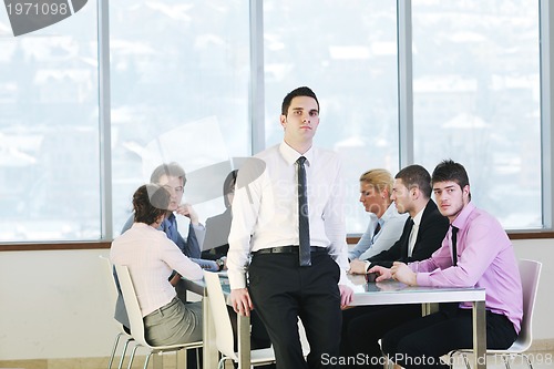 Image of group of business people at meeting