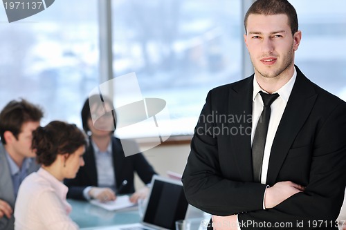 Image of group of business people at meeting