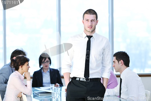 Image of group of business people at meeting