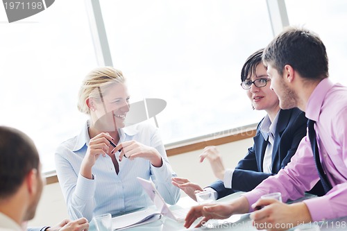 Image of group of business people at meeting