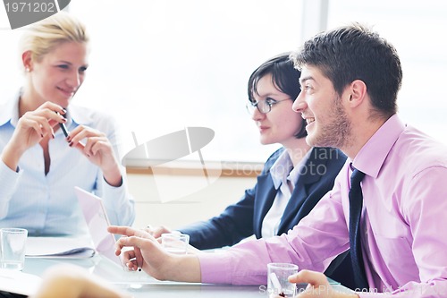 Image of group of business people at meeting