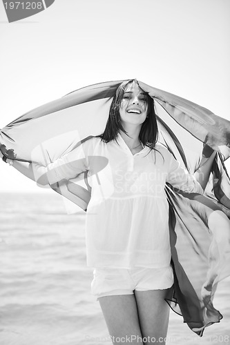 Image of young woman relax  on beach