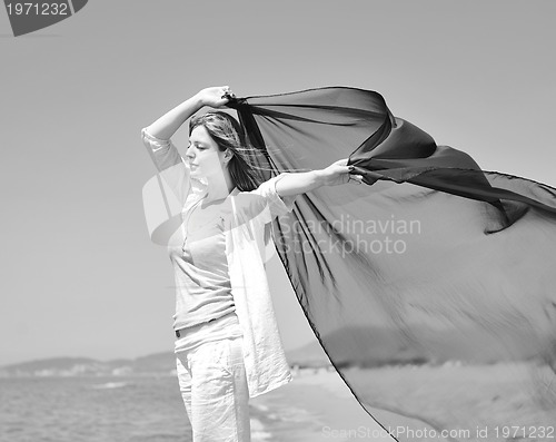 Image of young woman relax  on beach