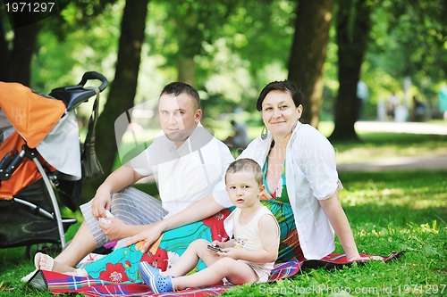 Image of Family at park relaxing and have fun