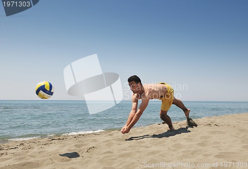 Image of male beach volleyball game player