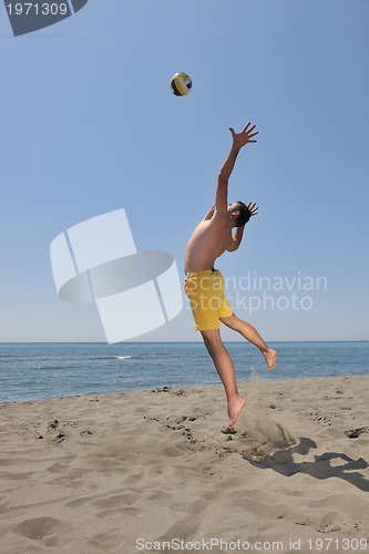 Image of male beach volleyball game player