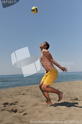 Image of male beach volleyball game player