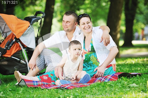 Image of Family at park relaxing and have fun