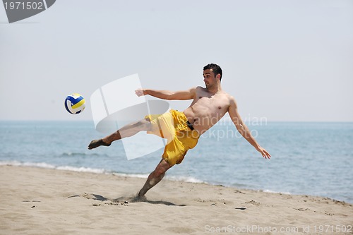 Image of male beach volleyball game player