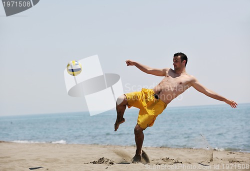 Image of male beach volleyball game player
