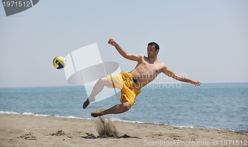 Image of male beach volleyball game player