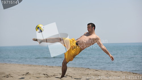 Image of male beach volleyball game player