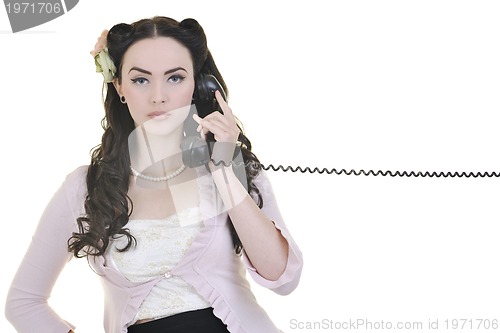 Image of pretty girl talking on old phone