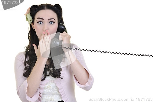 Image of pretty girl talking on old phone