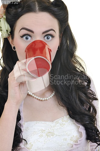 Image of beautiful young woman with red coup of coffee isolated on white