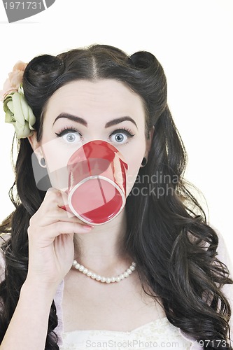 Image of beautiful young woman with red coup of coffee isolated on white