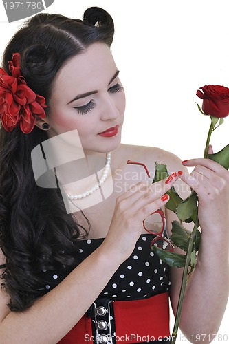 Image of young woman with rose flower isolated on white