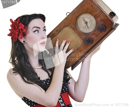 Image of pretty girl listening music on  radio 