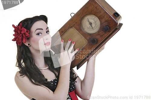 Image of pretty girl listening music on  radio