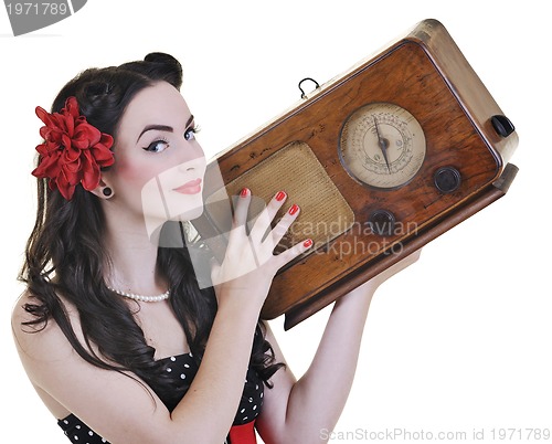 Image of pretty girl listening music on  radio 