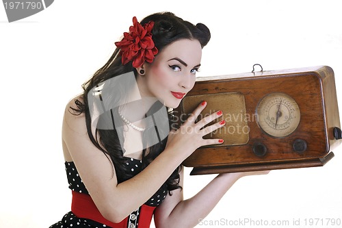 Image of pretty girl listening music on  radio